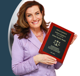 Eileen holding Top Attorney plaque