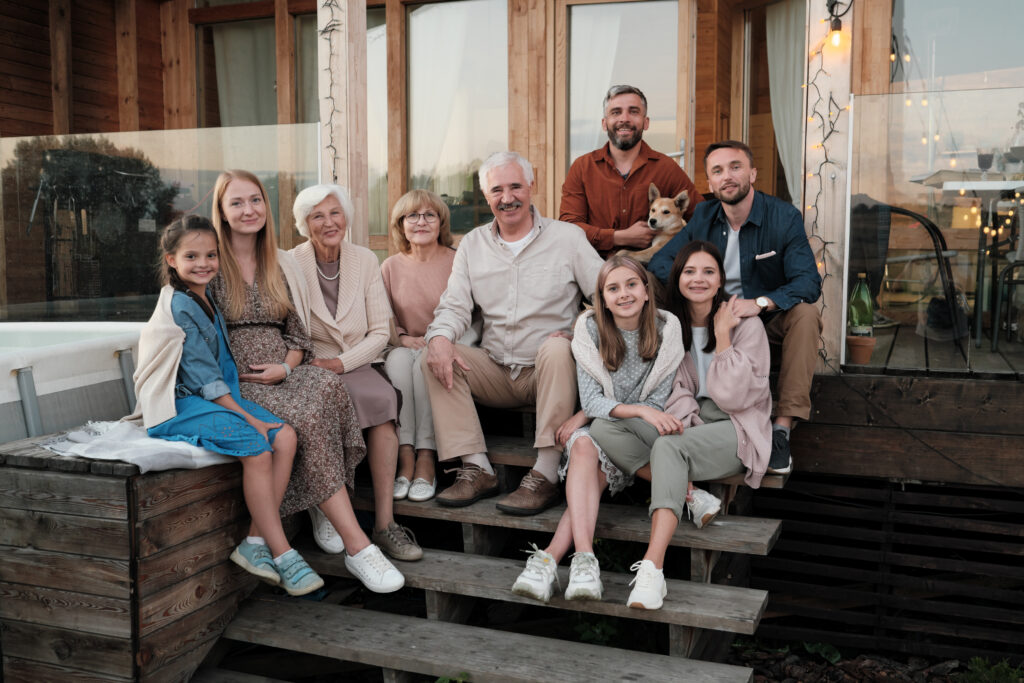 Portrait of Big Happy Family Sitting on Porch