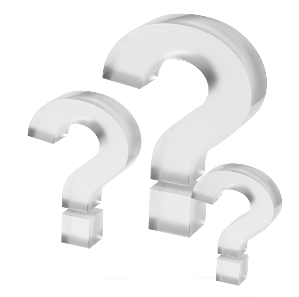 Three frosted glass question marks