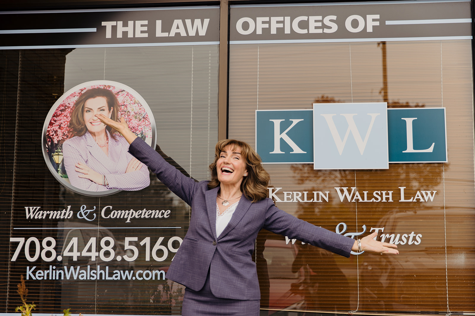 Eileen standing in front of her office building