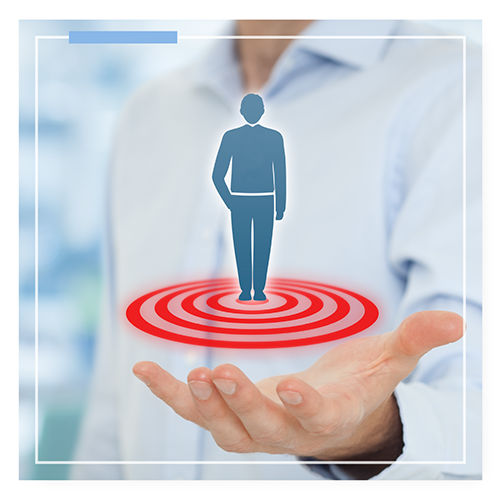 A person with a graphic of a person with a target under their feet in their hand