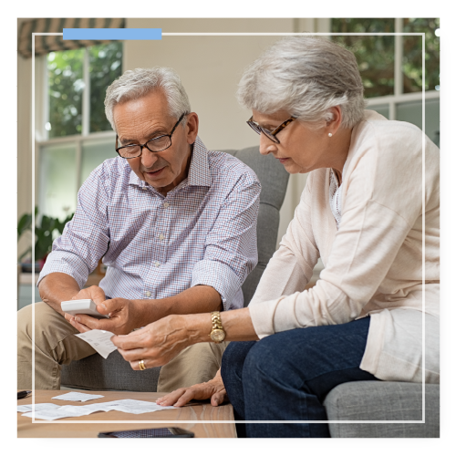 Senior couple reviewing paperwork