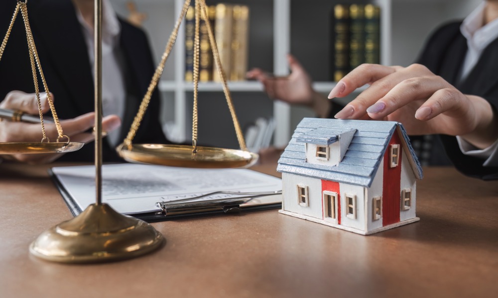 Kerlin Walsh Law attorney reviewing property documents<br />
